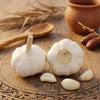 Bright white skin pure white garlic with large cloves for high end vegetable markets.